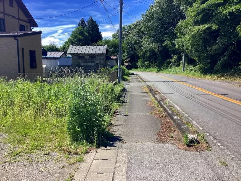 【宇都宮市新里町丁】西側前面道路（北側より撮影） ※街並み含む 現地（2026年6月）撮影